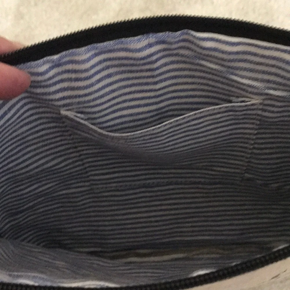 Adorable cosmetic or stash bag!  Never been used!